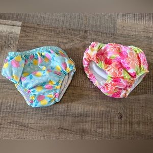 2 pairs of green sprouts swim diapers